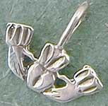 Claddagh charm pendant. The tradition of wearing charms dates back to medieval times. Objects were frequently worn from a cord or chain about the neck so they would not be lost. 3/4"W.