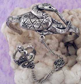 The medusa snake slave bracelet is made of lead-free pewter. One size fits all. The bracelet is adjustable.